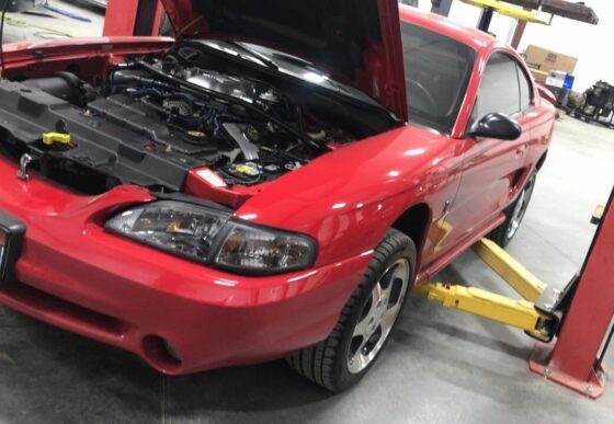 Vehicle with hood open during auto repair service at Hopkins Performance Automotive in Caldwell, Idaho